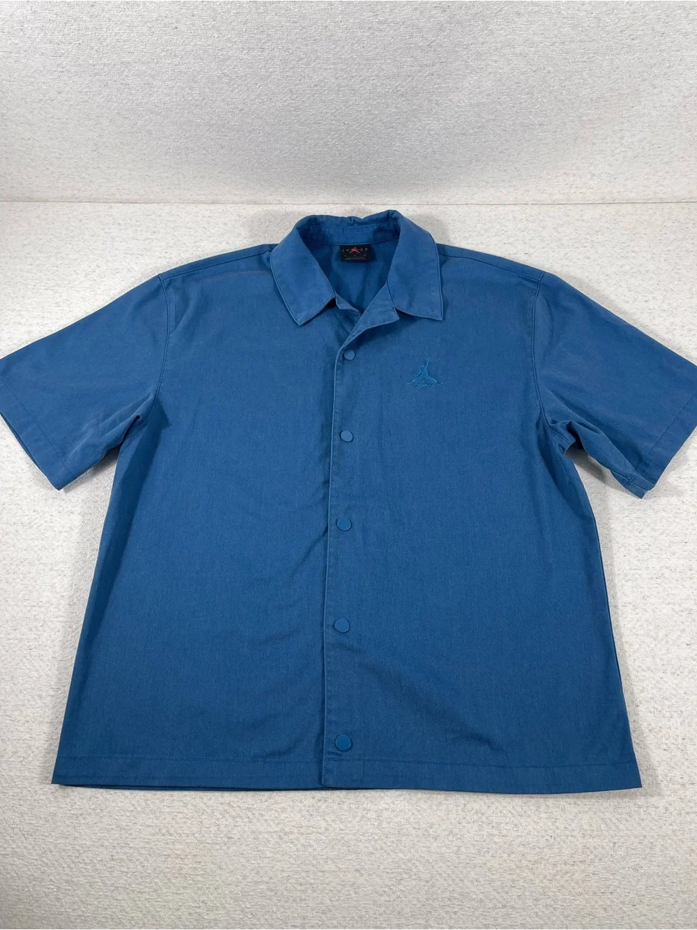 Jordan JumpmanY2K, Polo Medium Blue Short Sleeve Air Jordan Golf Shirt. SKU#0375